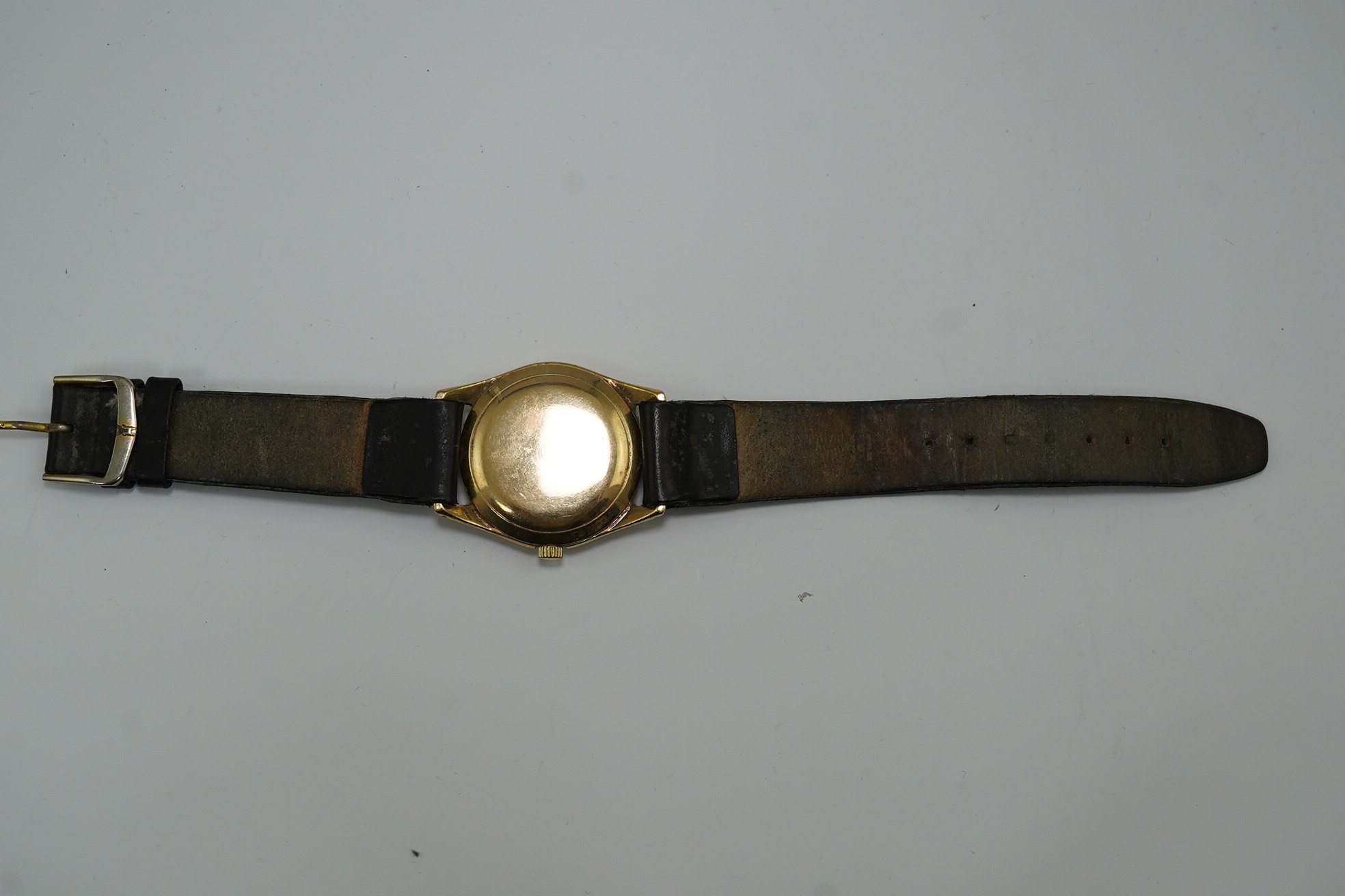 A gentleman's 1950's 9ct gold Omega manual wind wrist watch